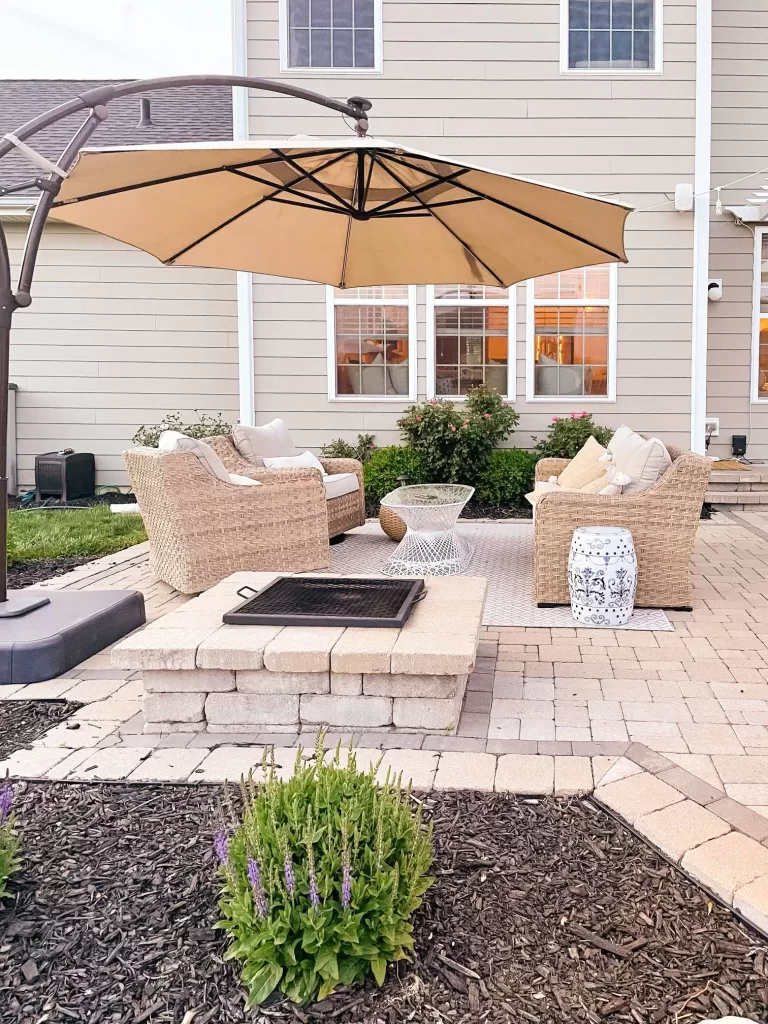 backyard paver patio with 5pc better homes and garden set from walmart, outdoor firepit, cantilever umbrella